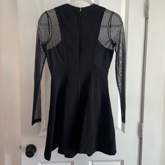 BCBGeneration Black dress - sheer sleeves 0 - Picture 1 of 3
